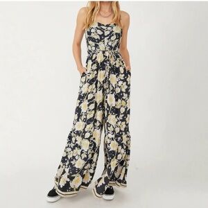 Free People Black Yellow Little of your Love Smocked Floral Jumpsuit size small